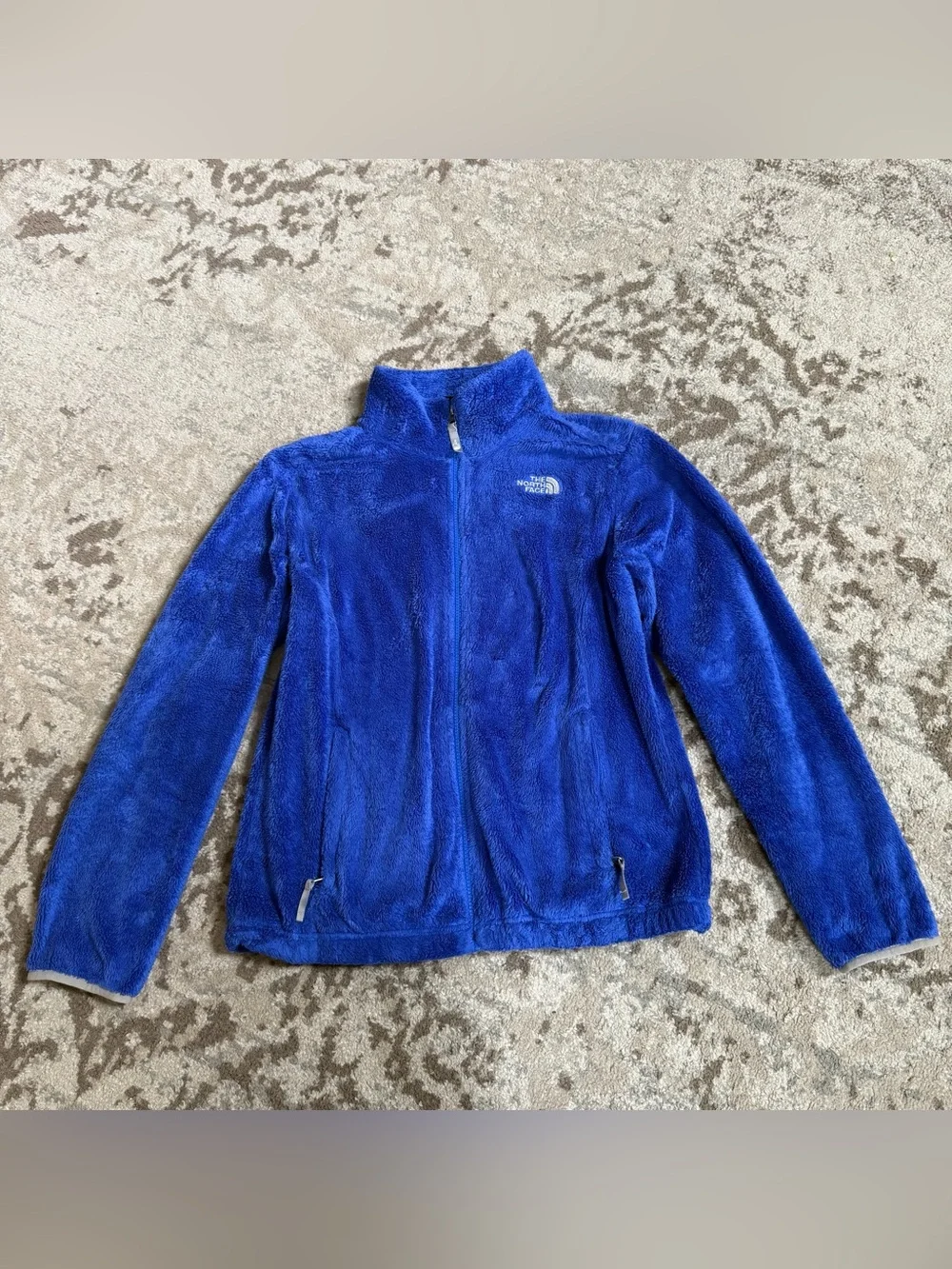 The North Face royal blue fleece fuzzy girls XL 18 Zip up jacket logo